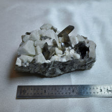 Load image into Gallery viewer, Smoky Quartz in Feldspar
